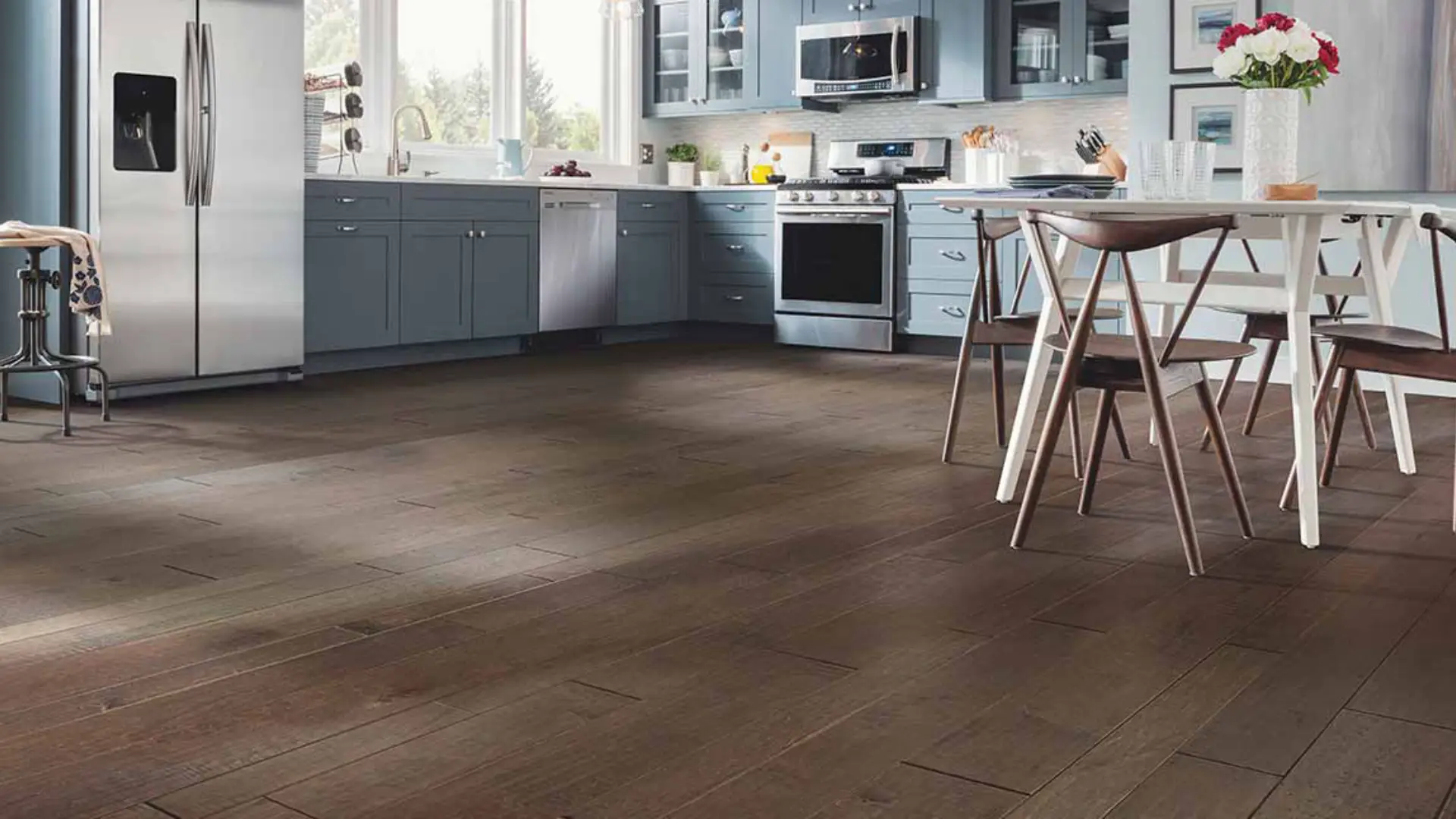 hardwood flooring in blue kitchen